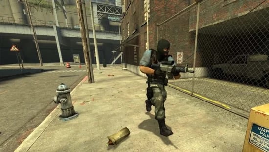 Counter-Strike: Source players in a classic 5v5 match on de_dust2