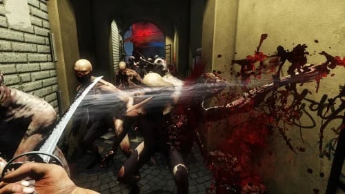 Killing Floor 2 players holding a wave together on a co-op Survival server